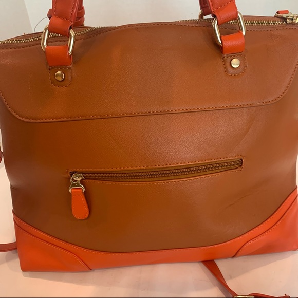 Orange handbag with a rust color body of bag and orange accent shoulder strap - Picture 8 of 16